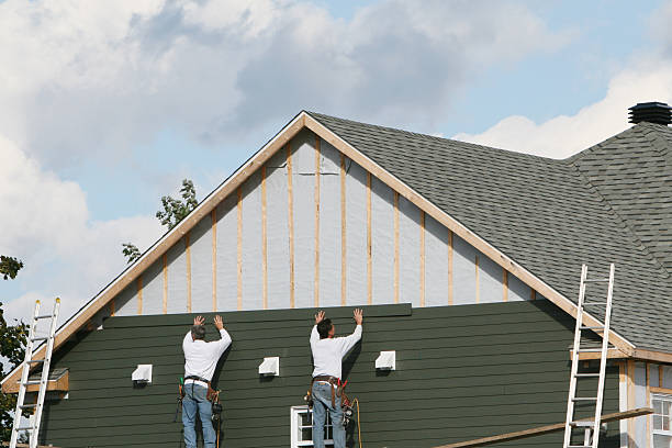 Professional Siding technician working in Oakboro, NC